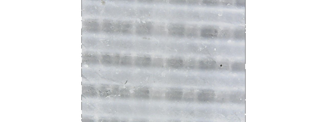 Upper surface of PLA, coated in soy wax. Same magnification as previous.